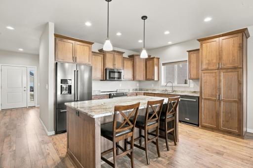 Kitchen with rich cabinetry and upgraded appliances
