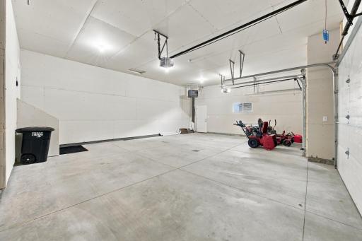 Large 3-stall garage, finished and heated with a floor drain