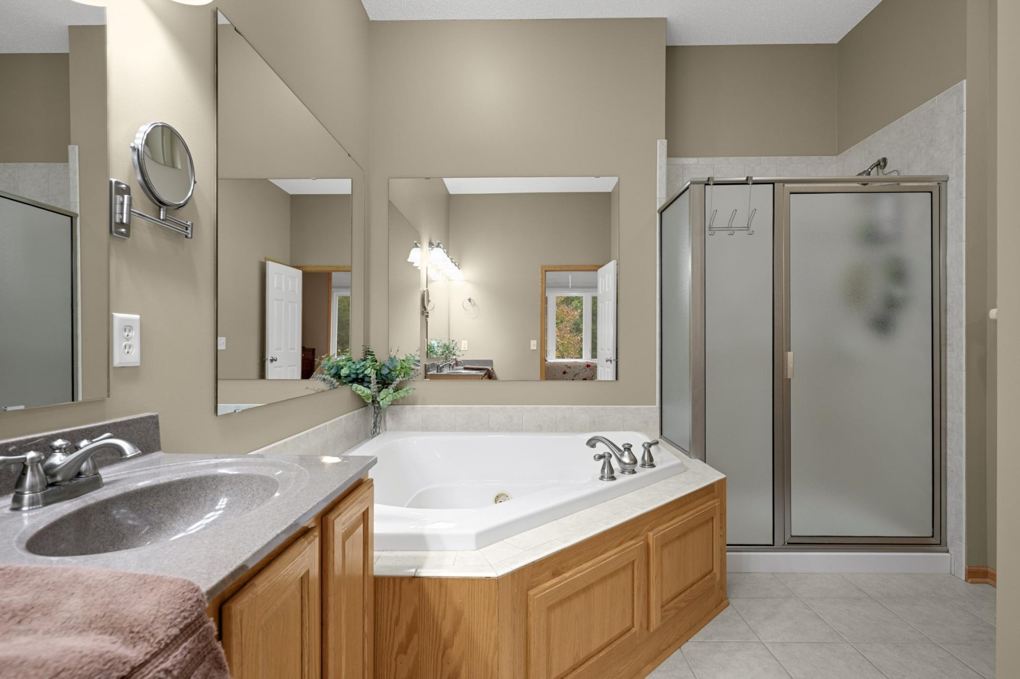 Enjoy a relaxing soak in the jetted tub or the convenience of a separate shower. The thoughtful layout gives you both options in your private Owner's Bath.