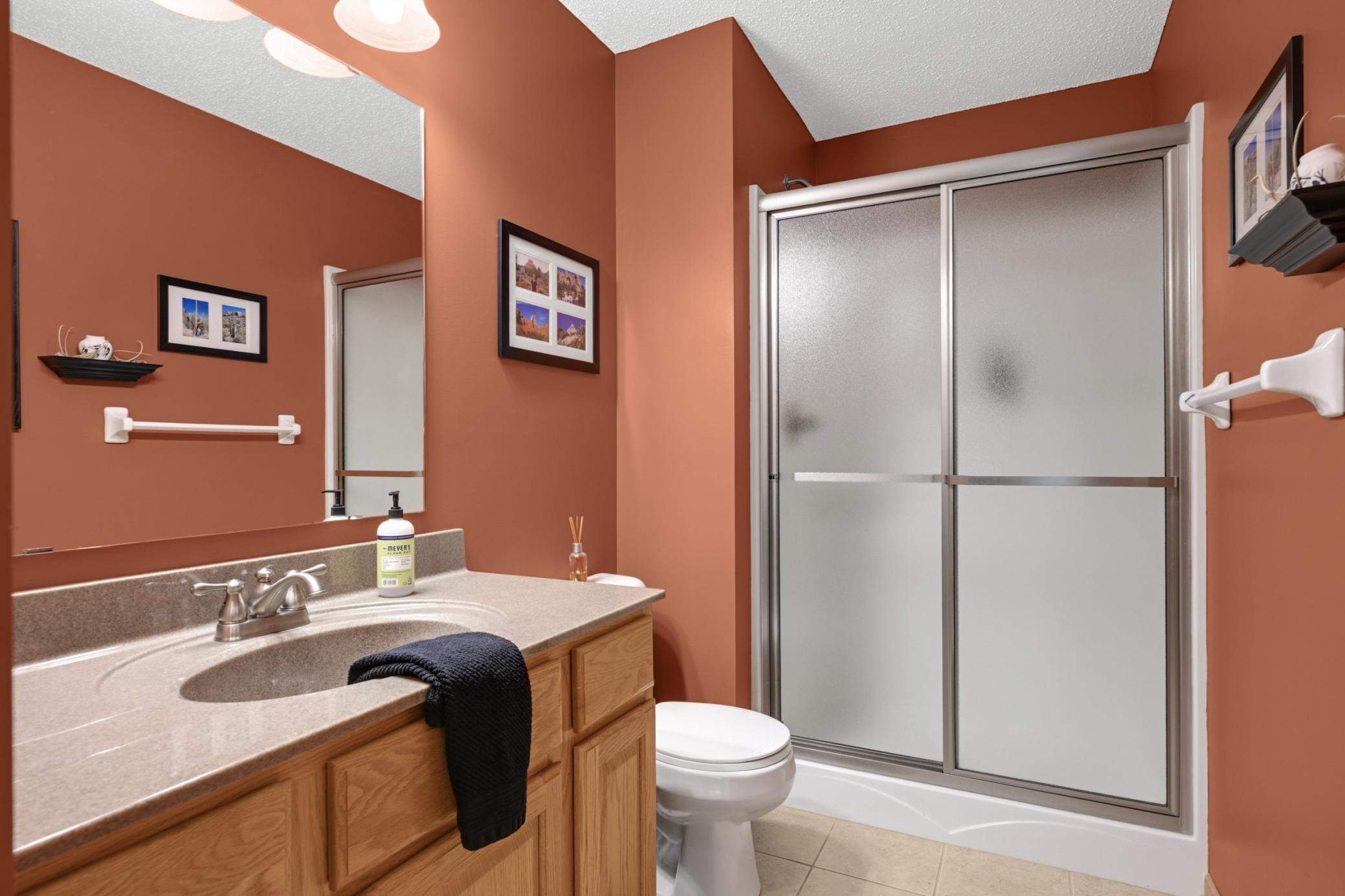 The Lower Level also features a 3/4 Bath with a shower, providing convenient bathroom access for both bedrooms and the Family Room.