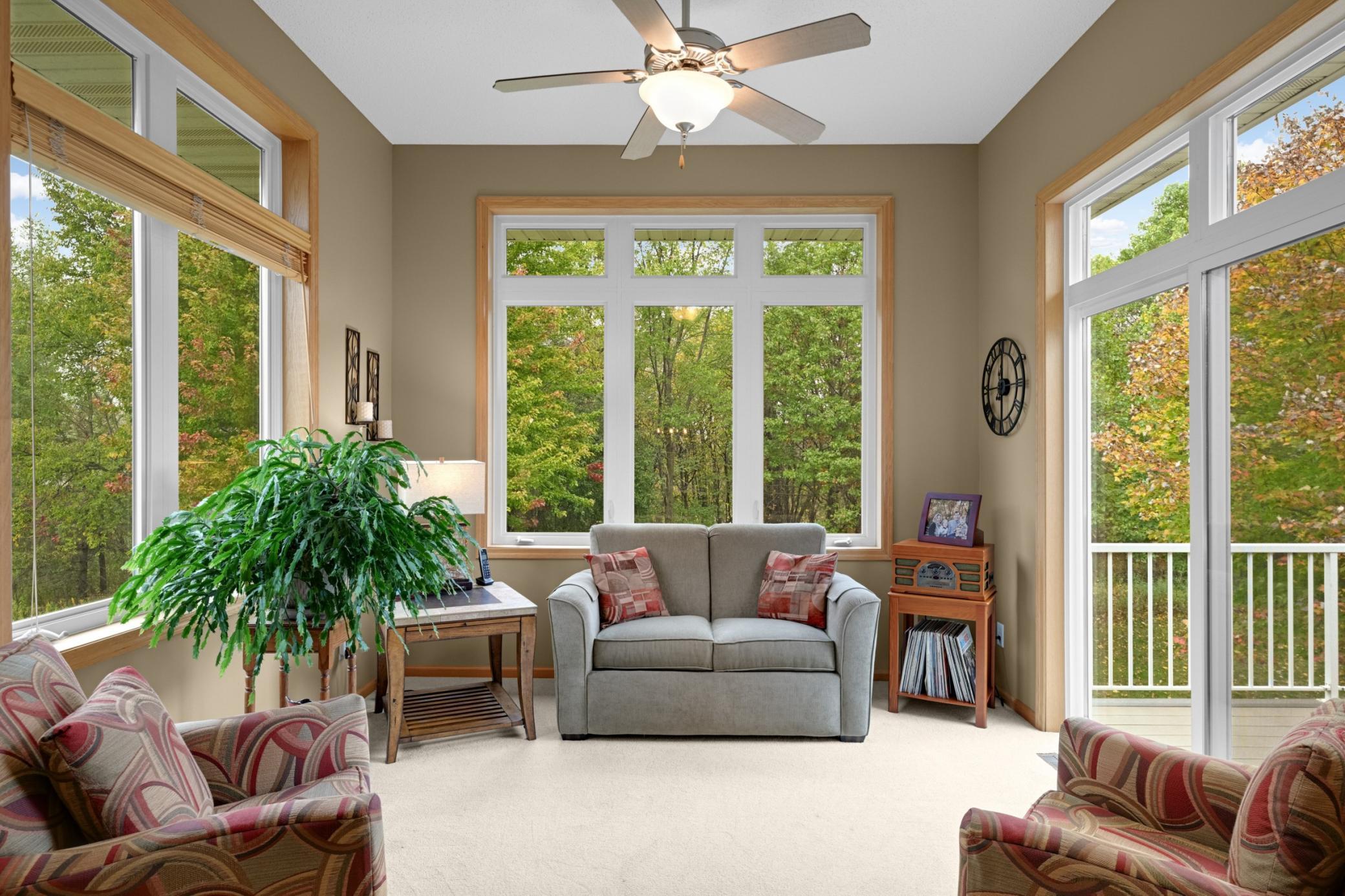 Surrounded by windows on three sides, this Sunroom is a wonderful place to enjoy your morning coffee, read a book or watch the changing seasons and wildlife. What a beautiful setting!