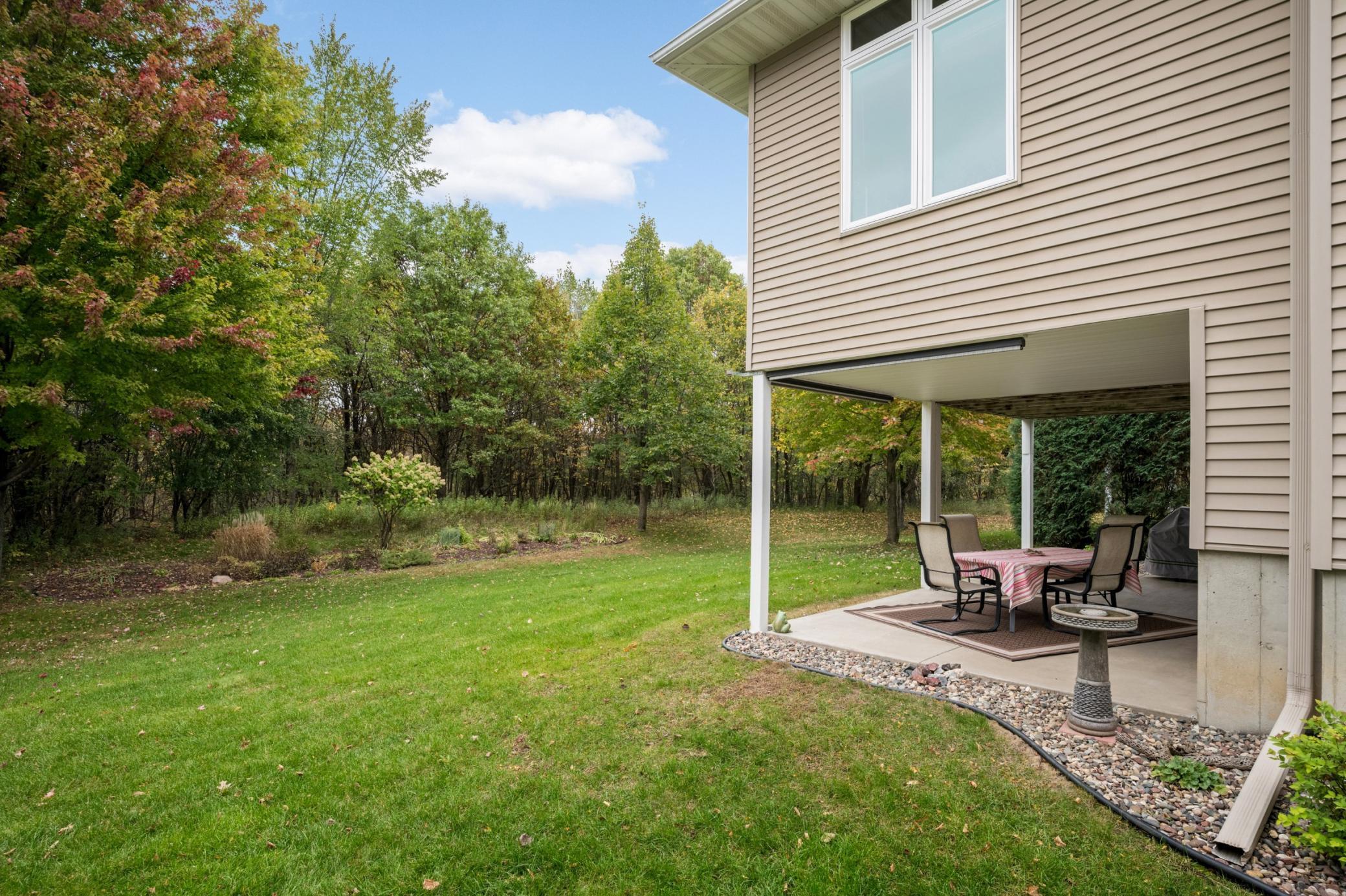 What a beautiful natural setting! Enjoy the covered Patio, wooded surroundings and garden area the sellers have enjoyed. The adjoining protected land provides a wonderful backdrop that cannot be developed.