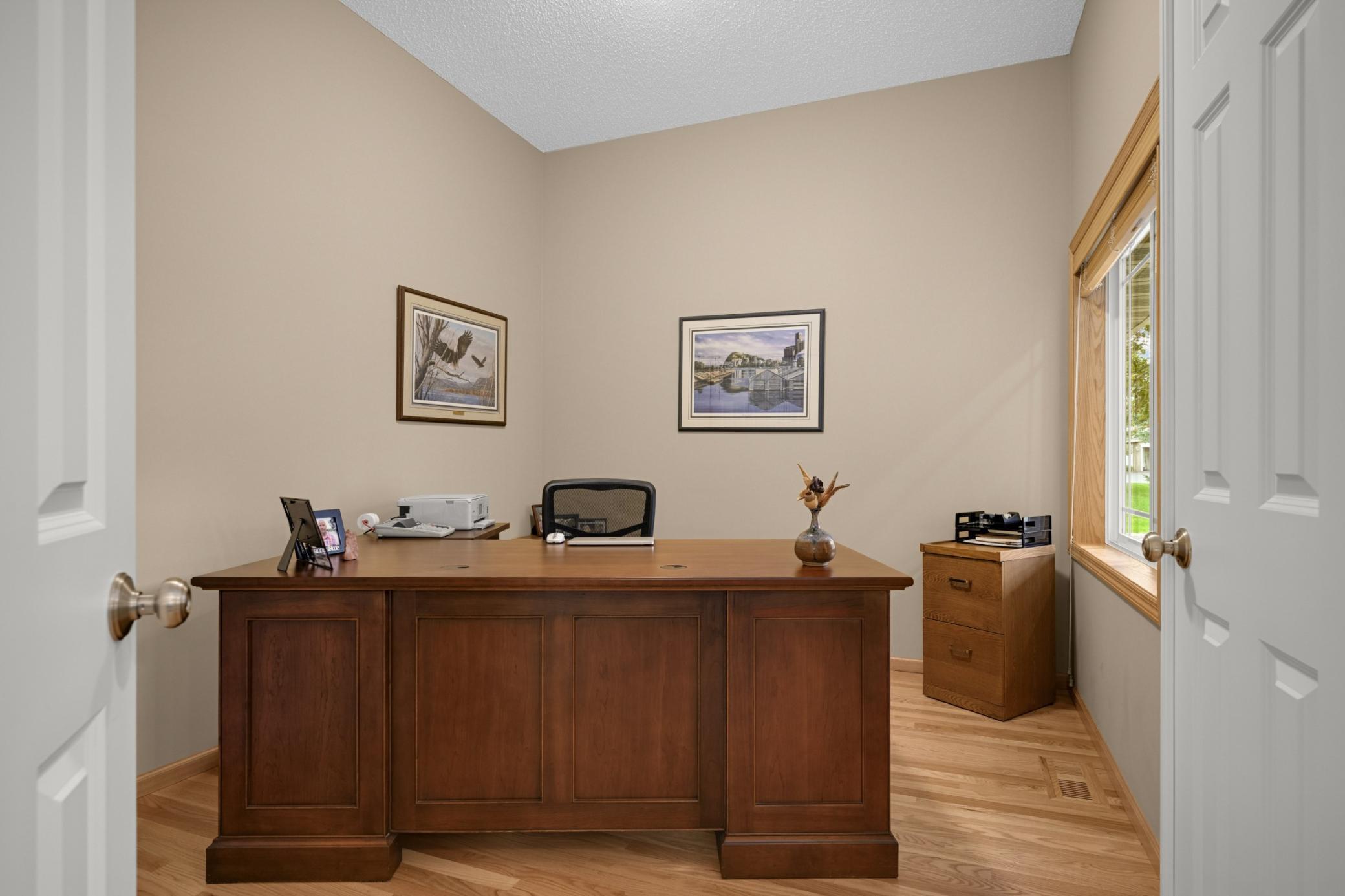 Conveniently located just off the Foyer, this room features French doors, beautiful hardwood flooring and a closet. Perfect for a home Office, but easily used as a second main-level Bedroom when needed!