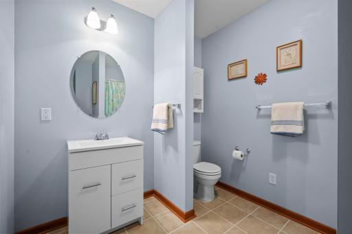 The lower level also includes a convenient half bath.