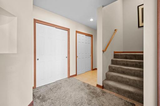 The finished walkout lower level offers even more living space, including a home theater room, two additional finished rooms to suit your needs, and a half bath.