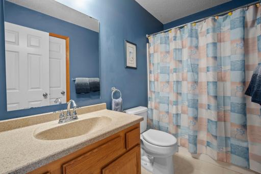 The upper level also includes a second full bathroom