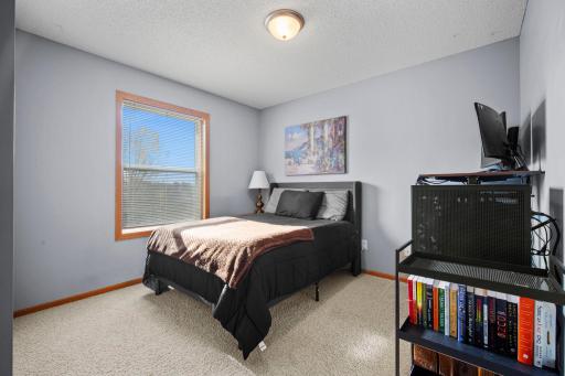 The upper level also includes a second bedroom.