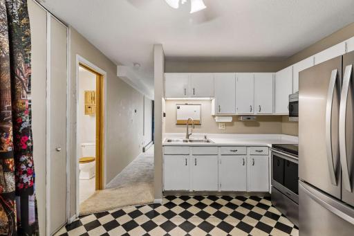 There is ample cabinet and counter space here.