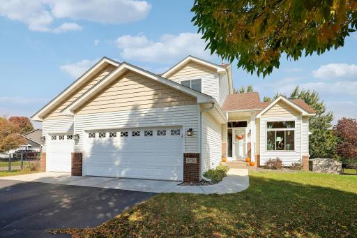 Welcome Home! Nestled into a large cul-de-sac lot, this lovely home boasts a fenced back yard surrounding a newer maintenance free deck and pergola.