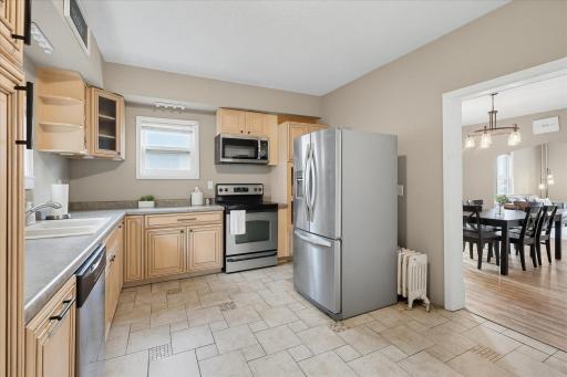 Prepare your favorite recipes in this open kitchen featuring stainless steel appliances!
