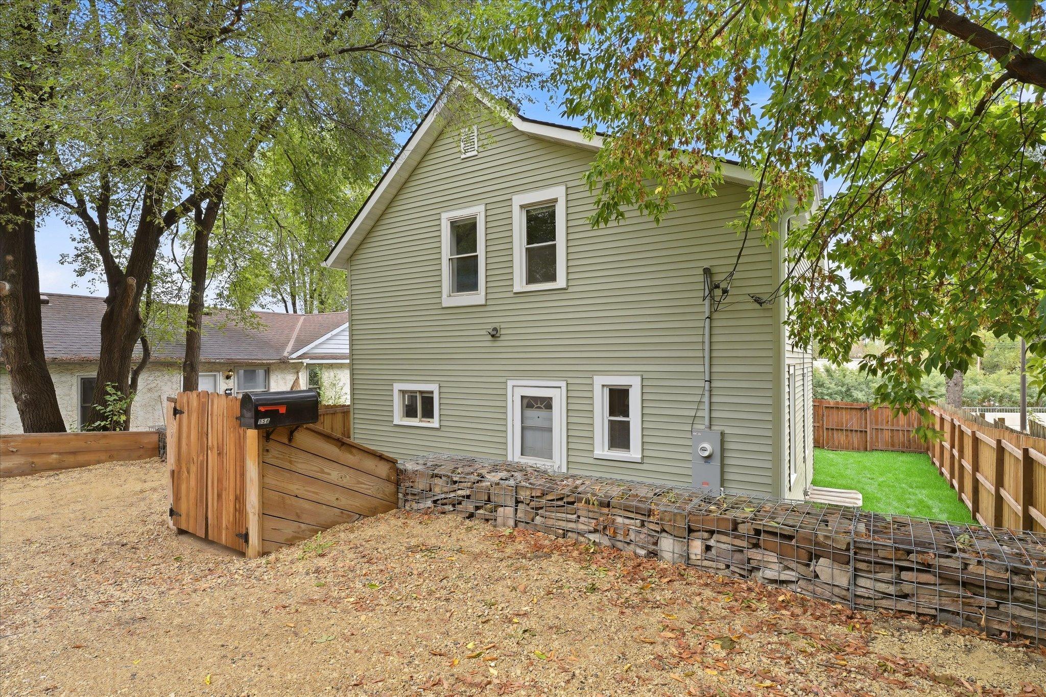 Convenient backyard gravel parking pad offers additional off-street parking!
