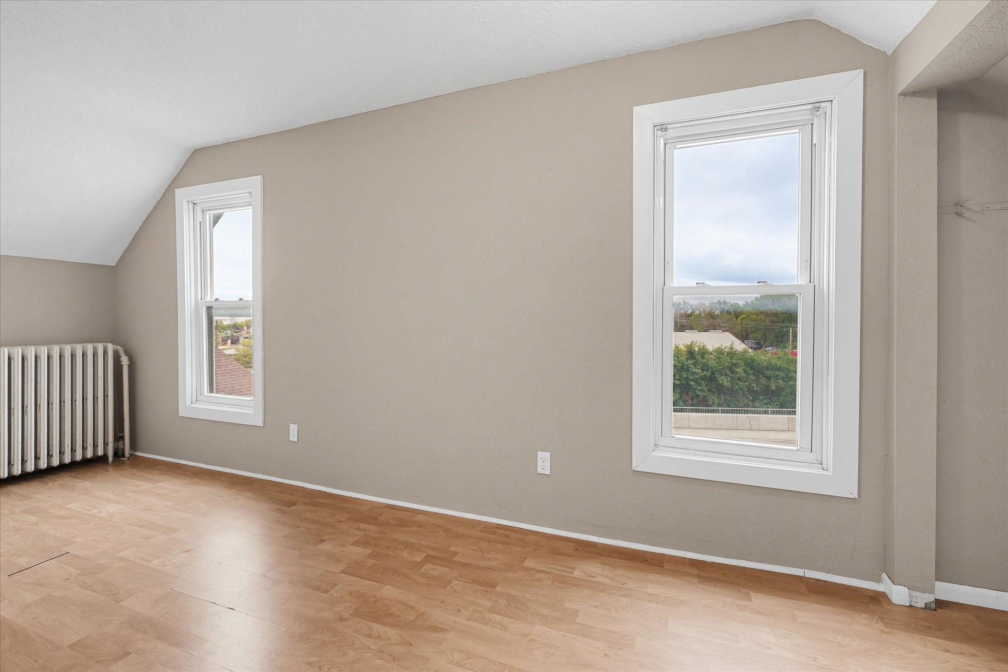 Third bedroom on the upper level is filled with natural light!
