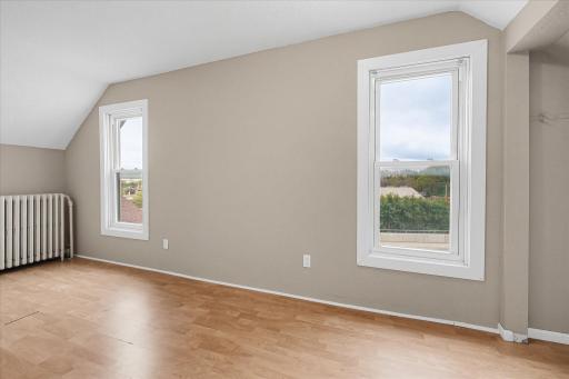 Third bedroom on the upper level is filled with natural light!