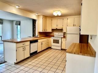 Open to Family Room and Views of the Private Back Yard