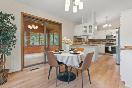 Dining Room with views of the porch and kitchen