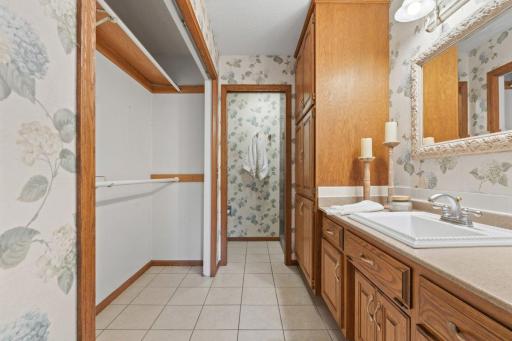 Primary Bedroom closet and private 3/4 bath