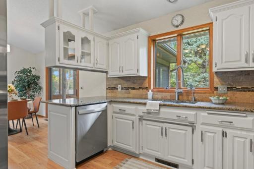 Granite Countertops and views of the back yard