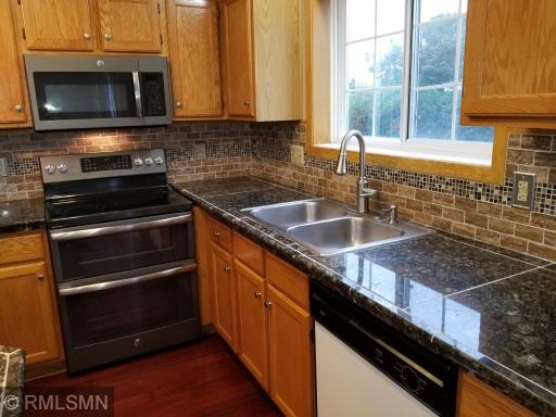 Window over the double stainless-steel sink and dishwasher
