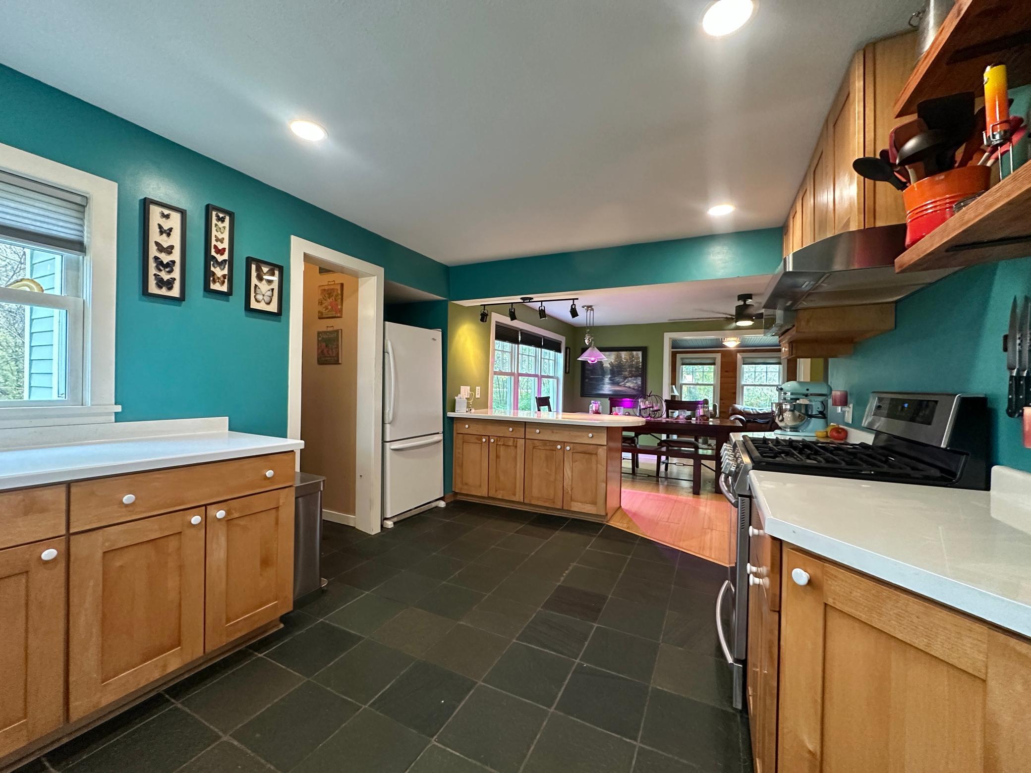 A look thru the kitchen to the dining room in the background.