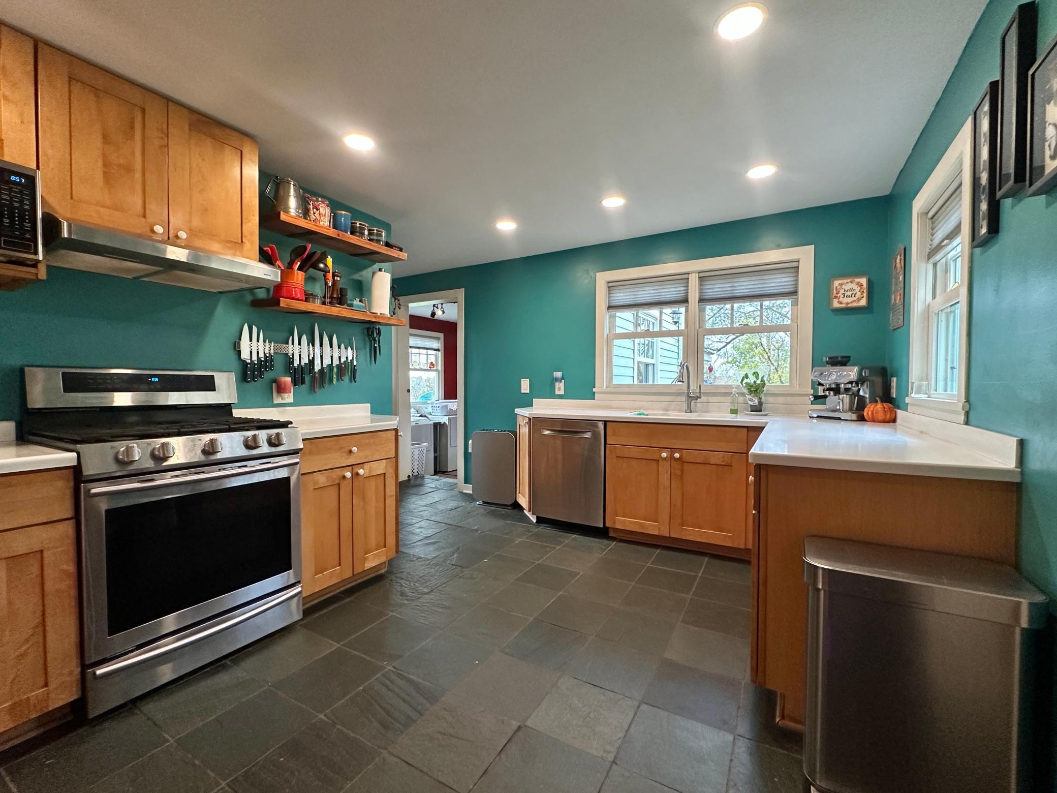 What you may enjoy the most in this kitchen is the lighting from LED to the natural.
