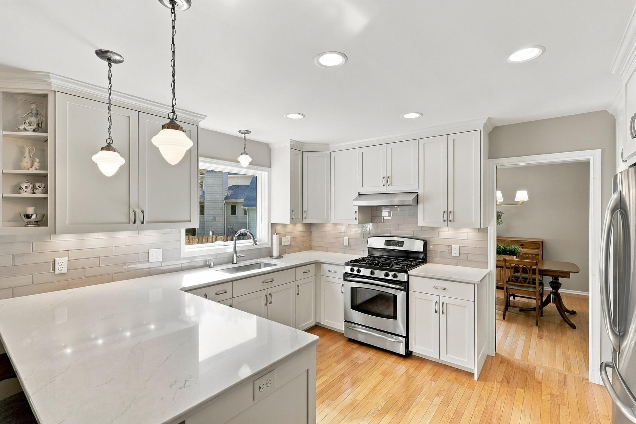 Custom white-enameled millwork adds a crisp, refined finish.