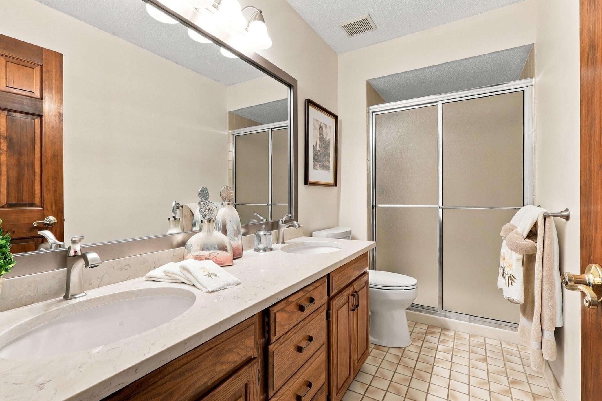 Updated bathroom featuring a fresh, modern look.