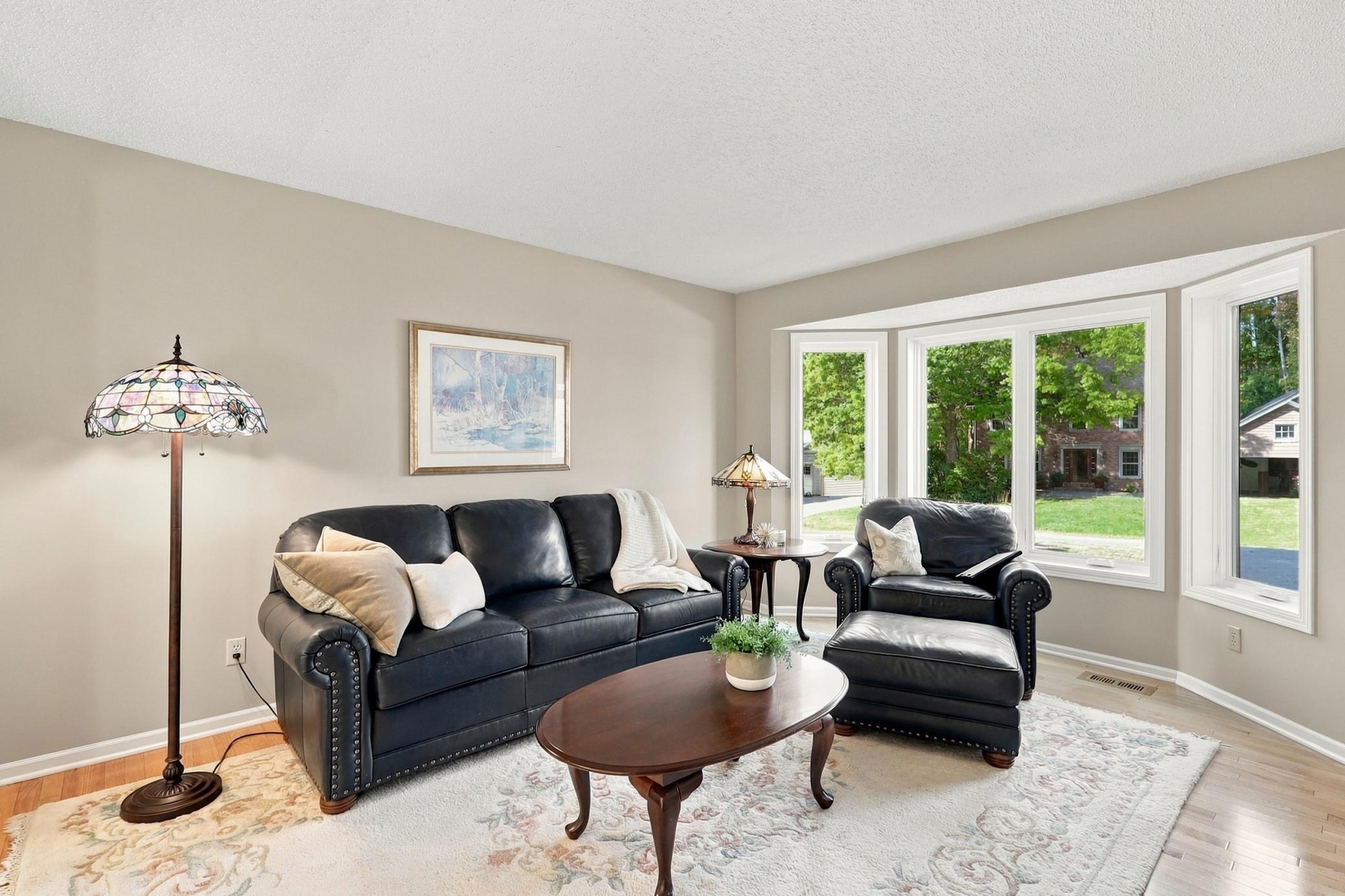 Formal living room offers a bright and inviting gathering space.