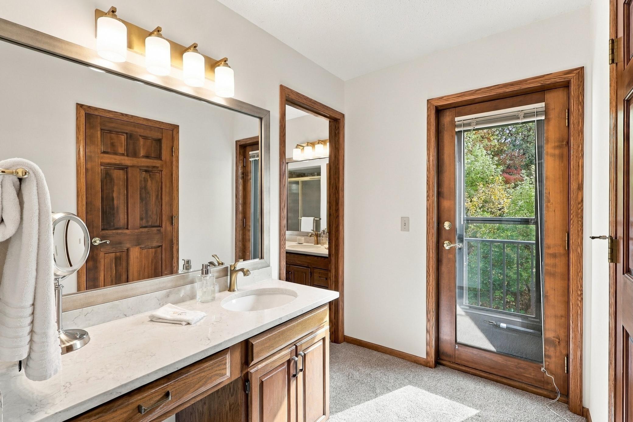 Updated primary bathroom with refreshed finishes.