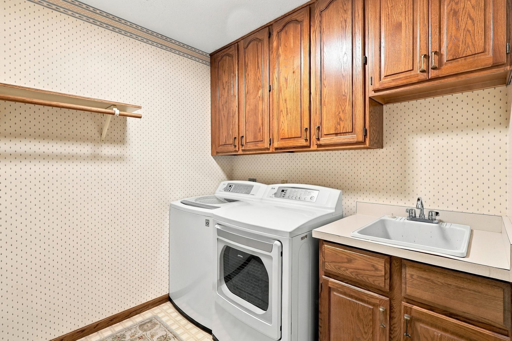 Main-floor laundry adds everyday convenience.