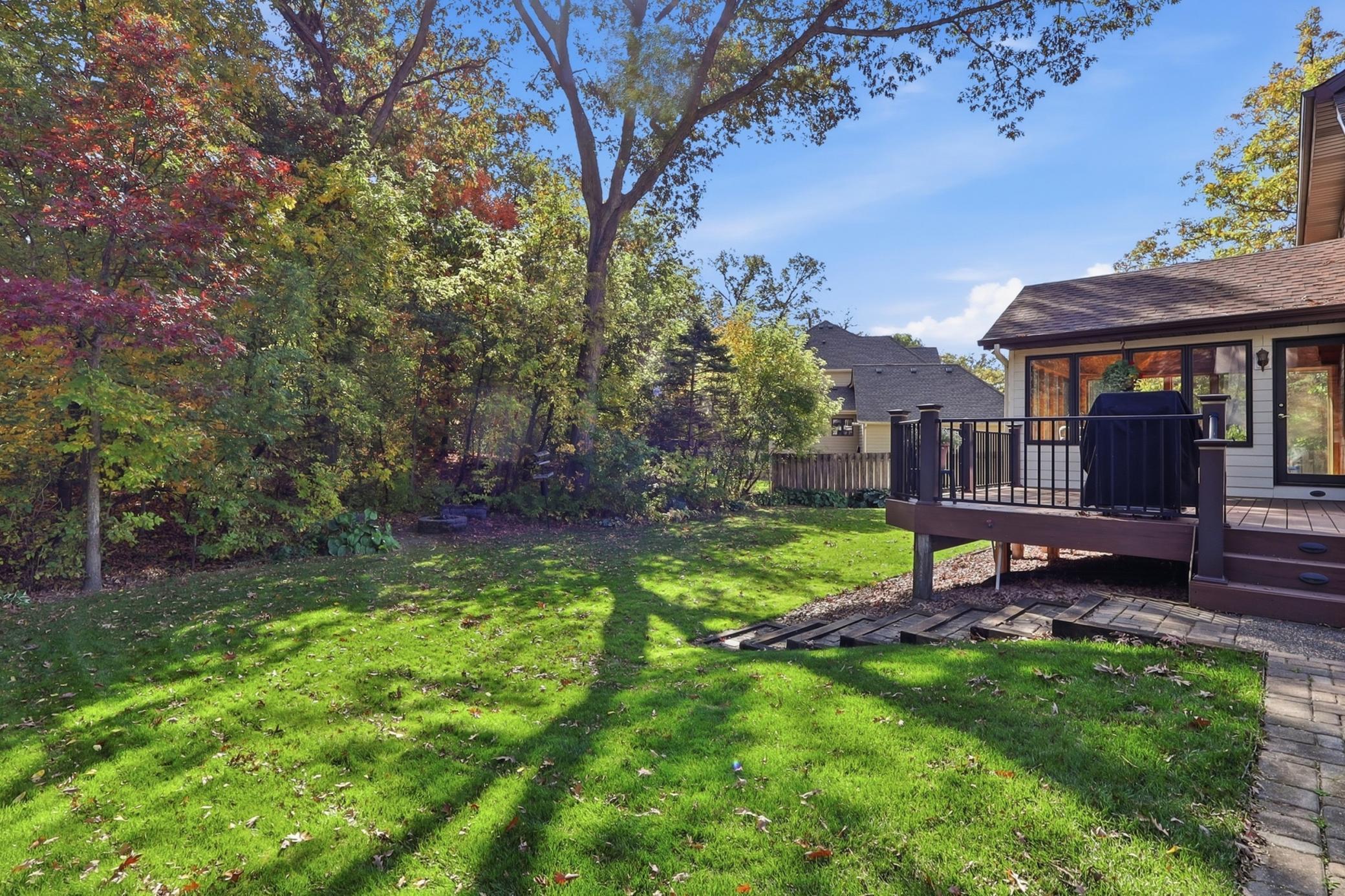 The backyard provides a wonderful extension of the home's comfortable living spaces.