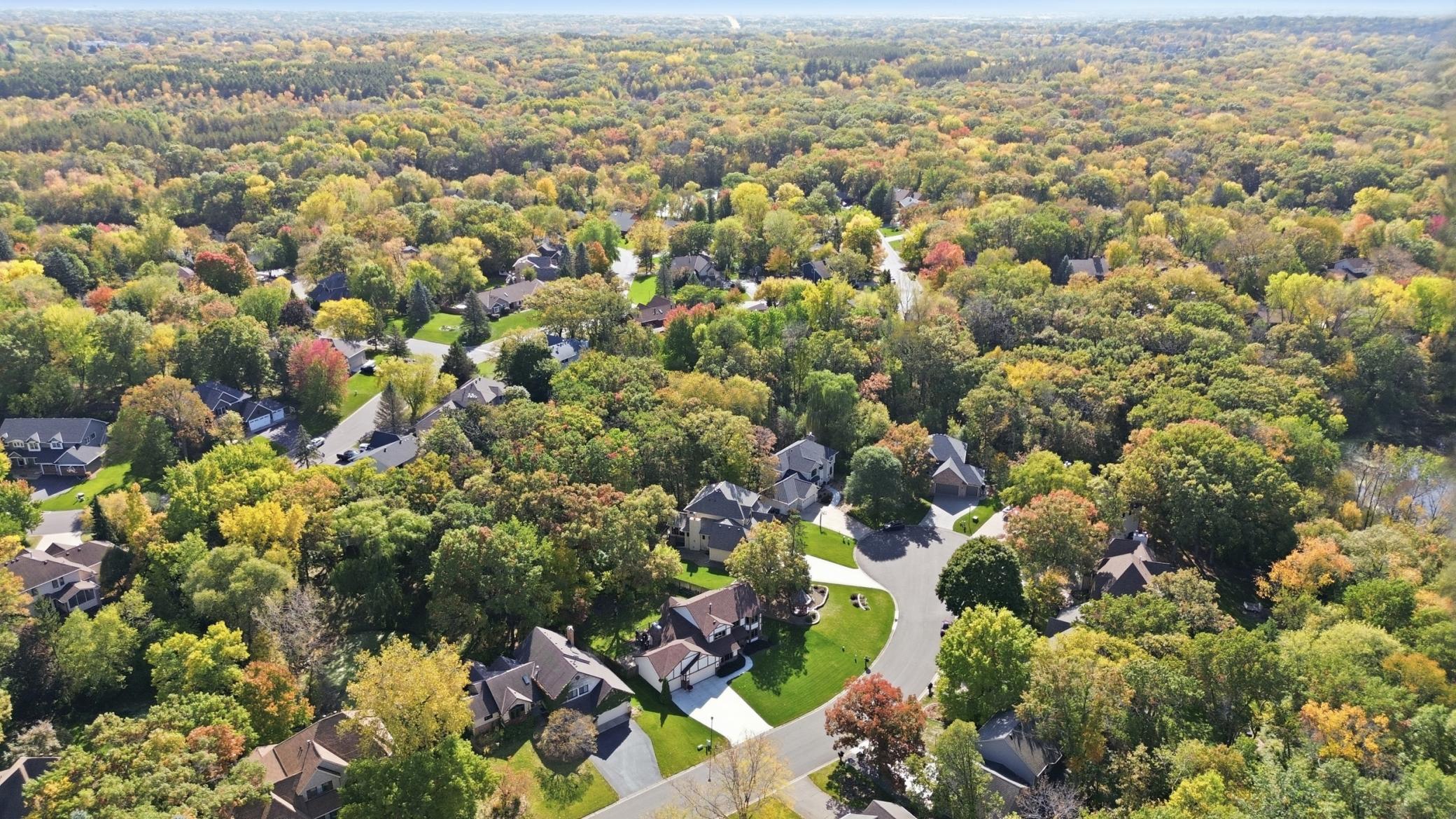Aerial view showcasing the home's setting in prestigious Brittany Estates.