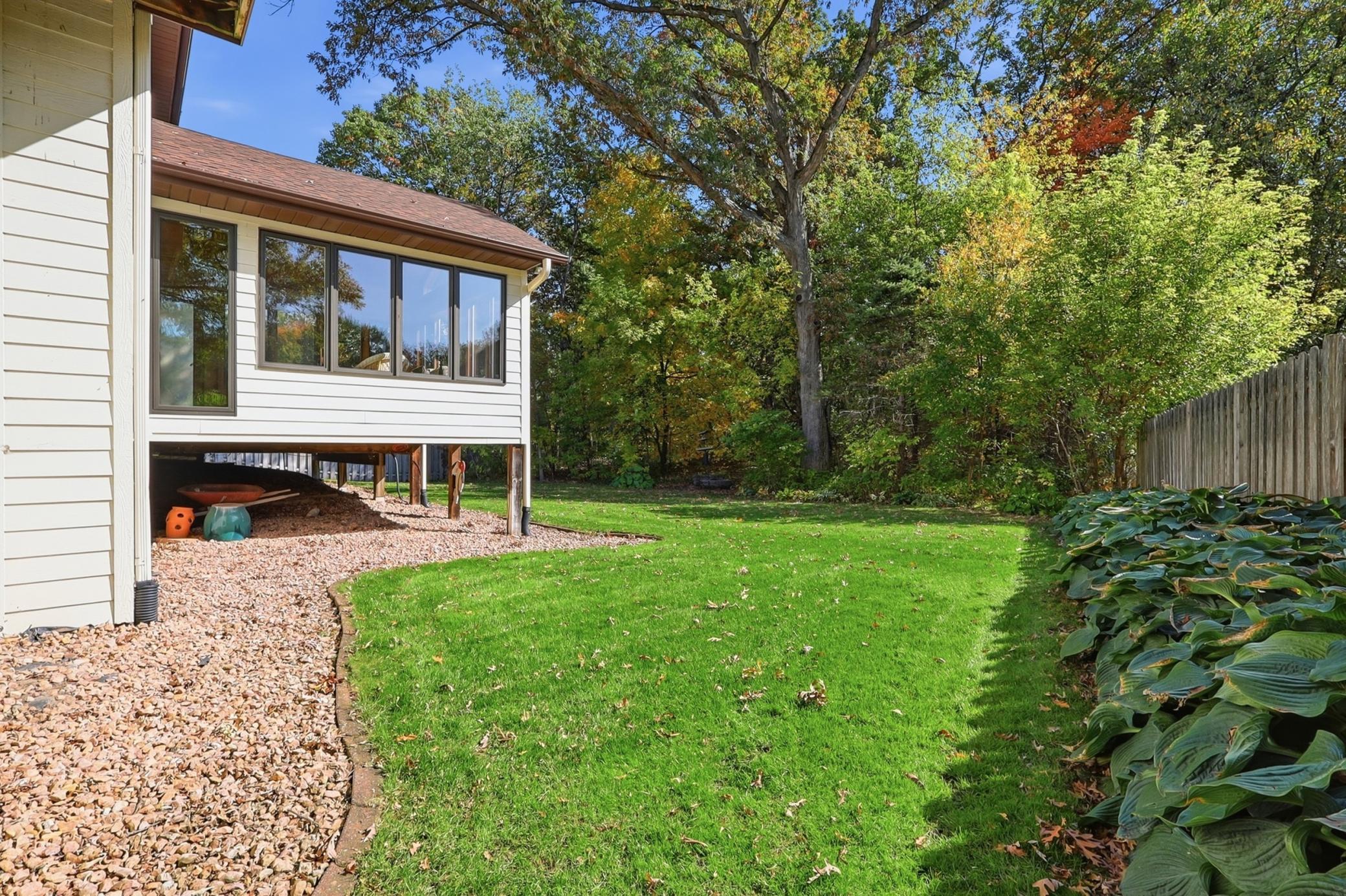 Private-feeling backyard setting creates a welcoming extension of the home's living space.