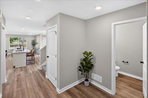 PHOTO OF A DIFFERENT HOME WITH SIMILAR PLAN & FINISHES. Plan and finishes may vary.