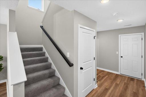 PHOTO OF A DIFFERENT HOME WITH SIMILAR PLAN & FINISHES. Plan and finishes may vary.
