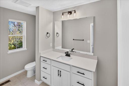 PHOTO OF A DIFFERENT HOME WITH SIMILAR PLAN & FINISHES. Plan and finishes may vary. Primary Suite Bathroom.