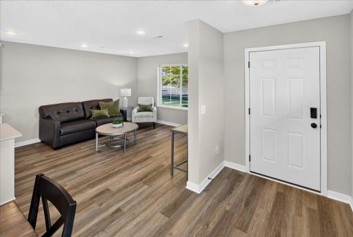 PHOTO OF A DIFFERENT HOME WITH SIMILAR PLAN & FINISHES. Plan and finishes may vary.