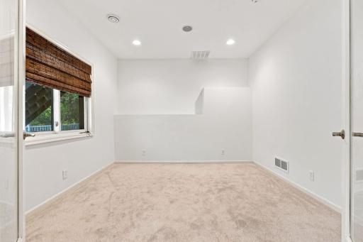 Lower-level bedroom offers a private and comfortable space.