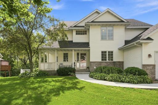 The wrap around front porch is the perfect spot to create a relaxing outdoor retreat.