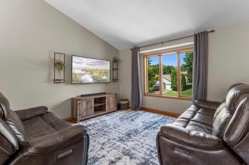 Bright living room with vaulted ceilings