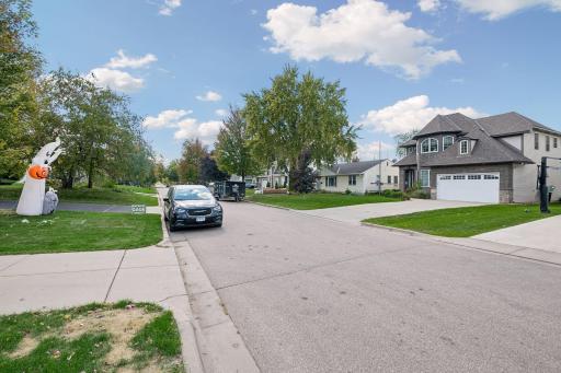 It is located in a residential area with mature trees.
