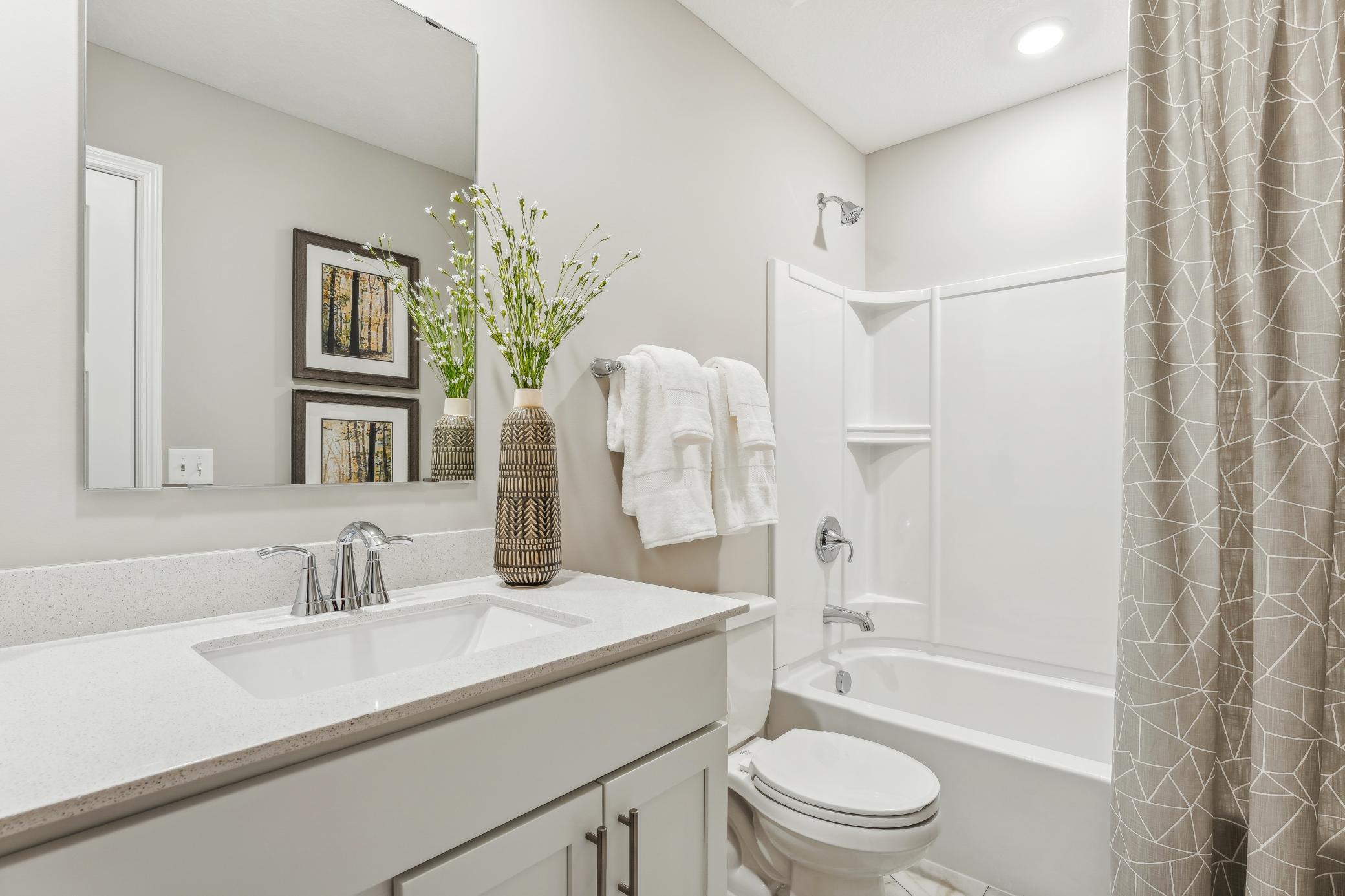Photo is of a decorated model, colors and features will vary.