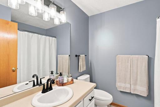 Upper level full bathroom close to both bedrooms.