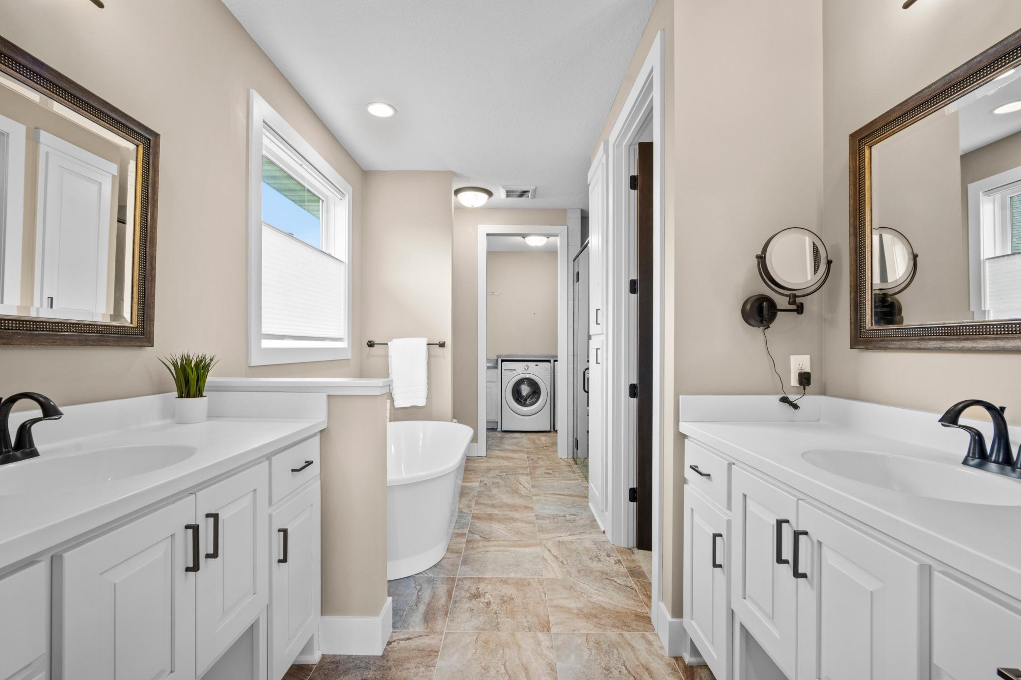 Primary bathroom has in floor heat and 2 seperate sinks