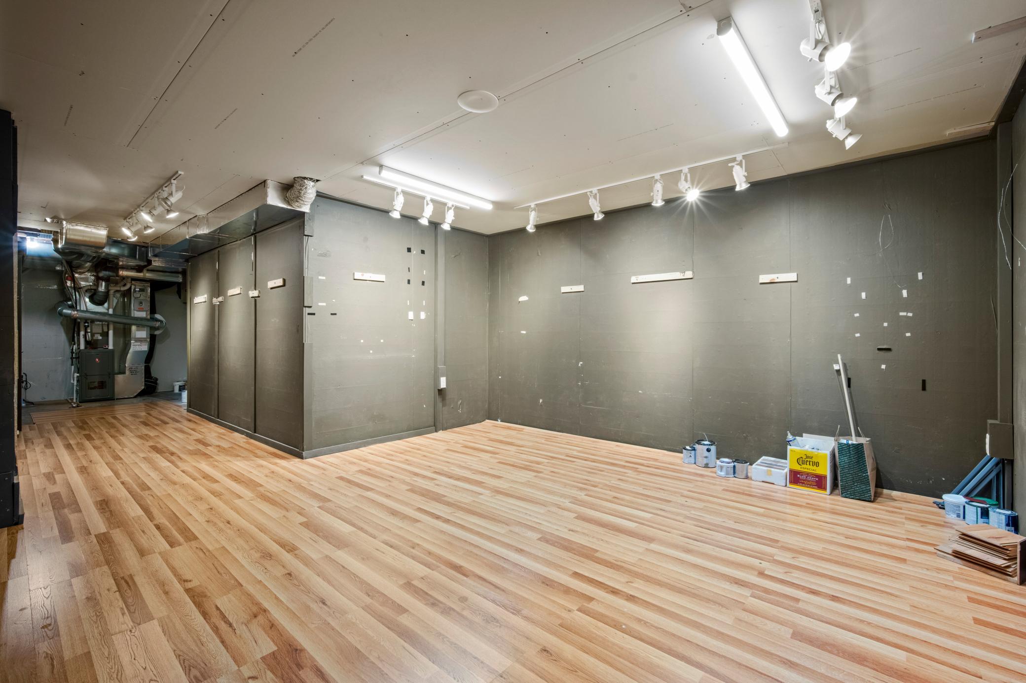 This could be a lower level exercise room, hobby room or just extra storage