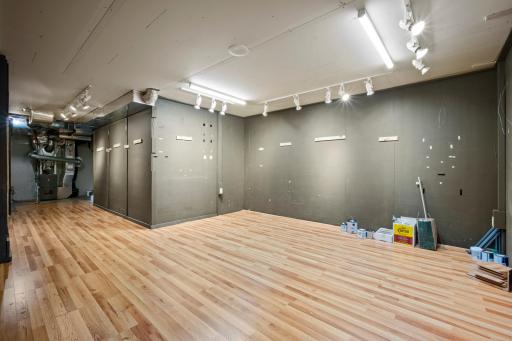 This could be a lower level exercise room, hobby room or just extra storage