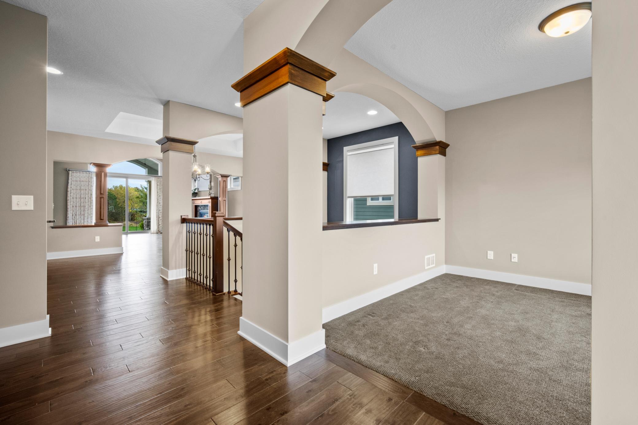 To the right of the entry is a flex space for your sitting room, library area or office.