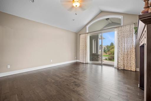 The large sliding glass doors and transom window allow light to flood the living room