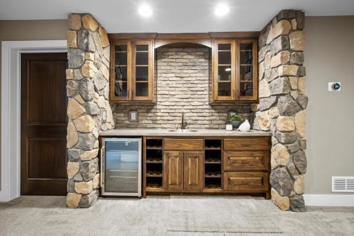 Look at this wet bar! So much detail here. Includes a winefridge