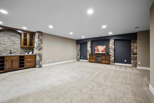 Built in cabinetry and gorgeous stone work makes this space feel extra special