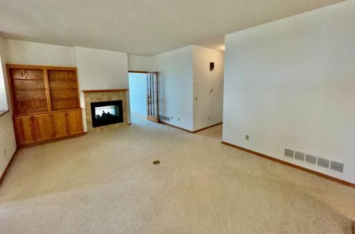 Includes built-in cabinets and gas fireplace